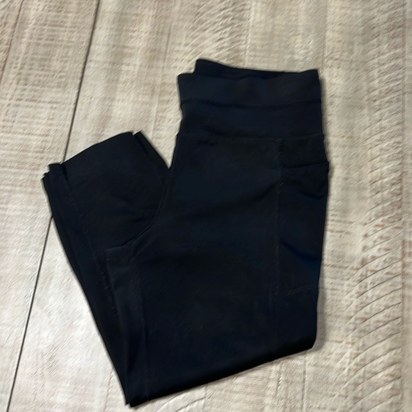 Tangerine Pants - 3:$25 Tangerine capri leggings with cute cut outs down outside of each calf.